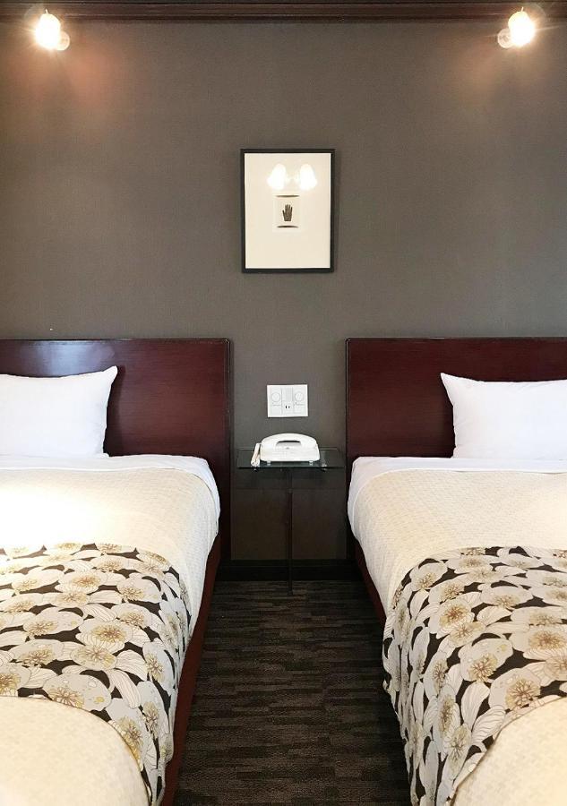 Hotel Okus Kumamoto Rum bild